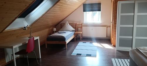 Ένα ή περισσότερα κρεβάτια σε δωμάτιο στο Schulinska Apartment