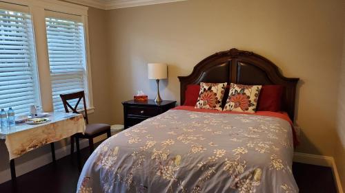 מיטה או מיטות בחדר ב-White Rose House