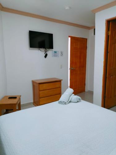 Cama o camas de una habitación en Posada Yasa sarie bay