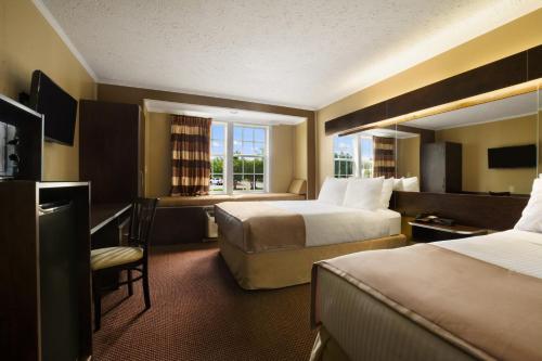 Postel nebo postele na pokoji v ubytování Microtel Inn & Suites by Wyndham Columbia Fort Jackson N