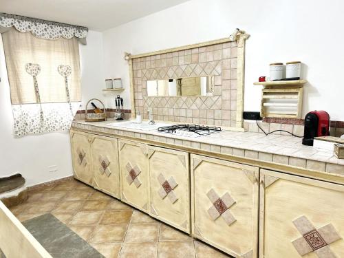 Кухня или мини-кухня в Maria Antonietta House
