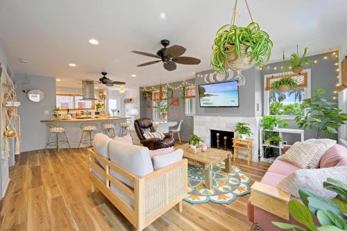 a living room with a couch and a table at Little “house” right on the beach in Hollywood