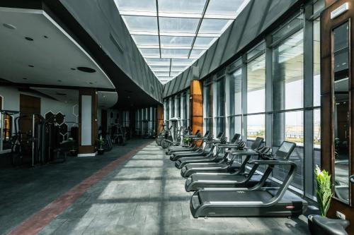 a row of chairs in a building with windows at Gewan White Beach Resort-New Alamein in Marsa Matruh