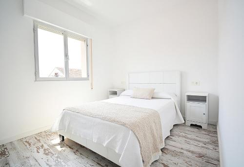 A bed or beds in a room at Casa con piscina en zona rural