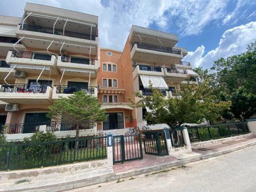 an apartment building on the side of a street at B6 COQUETTE in Nea Chili