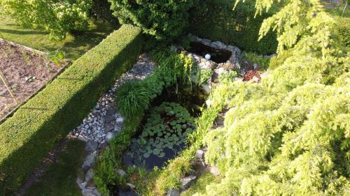 an overhead view of a garden with plants at Apartment Sonata in Kamnik