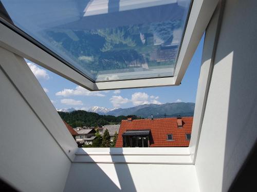 a skylight in a house with a roof at Apartment Sonata in Kamnik