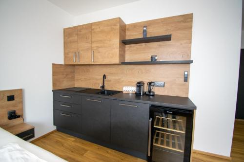 Virtuvė arba virtuvėlė apgyvendinimo įstaigoje Smart Rooms Wels