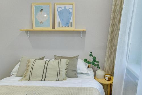 Cama o camas de una habitación en Astoria Apartments