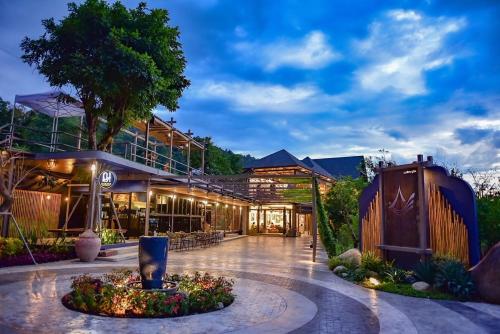 an exterior view of a building at night at Yatika Boutique Chiang Dao in Chiang Dao