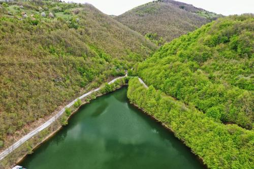 an aerial view of a river in a valley at Brvnara Djordje tri zbezde in Kokin Brod