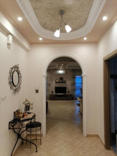 a hallway with a coffered ceiling and an archway at POPI 'S HOME in Skala Sotiros