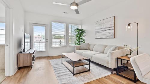 a living room with a couch and a table at Beltline 1 bdrm Apt in Atlanta
