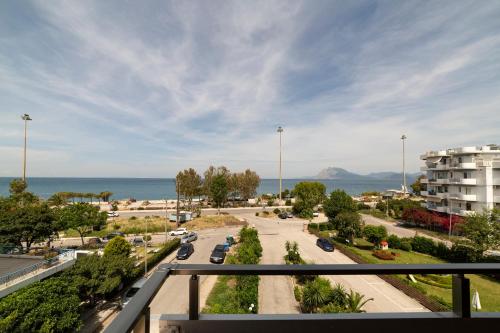 a view of a street with cars on the road at Delfini Hotel in Patra