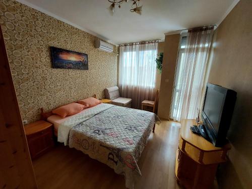 Postel nebo postele na pokoji v ubytování Апартамент Кънтри-Лариса