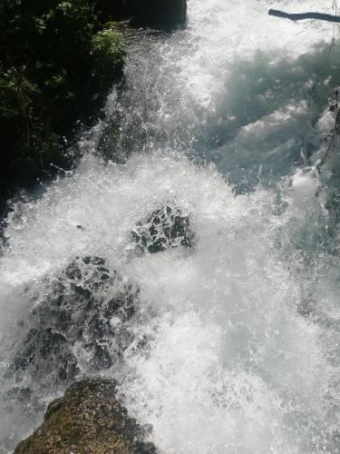 a stream of water with foam on top of it at Ferienhaus Krallinger in Abtenau