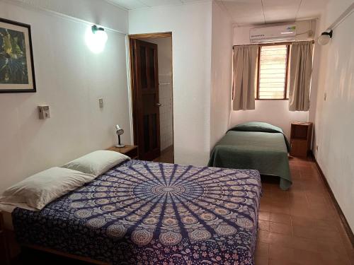 Cama o camas de una habitación en Hotel Tajalin