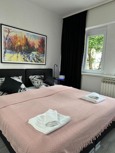 Кровать или кровати в номере Apartment Marijana