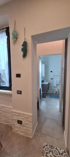 Kylpyhuone majoituspaikassa Appartamento La Casétta