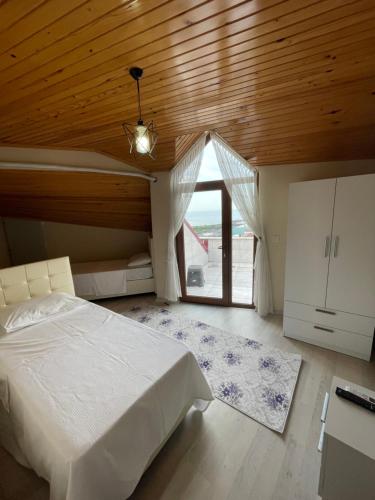 Ένα ή περισσότερα κρεβάτια σε δωμάτιο στο Anatolia SUITE APART