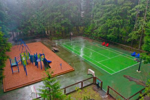 an aerial view of a tennis court in the rain at Snowater Nook in Deming