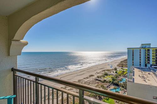 a balcony with a view of the beach and a building at Beautiful Ocean views, on 15th floor! in Myrtle Beach