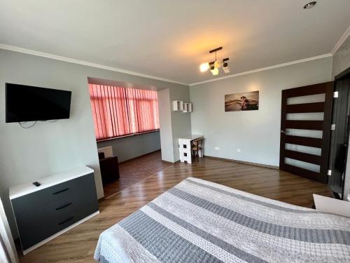 Postel nebo postele na pokoji v ubytování Apartment Halits'ka 133