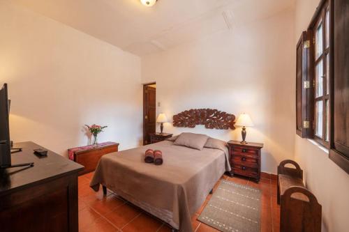 Ένα ή περισσότερα κρεβάτια σε δωμάτιο στο Casita Los Búhos