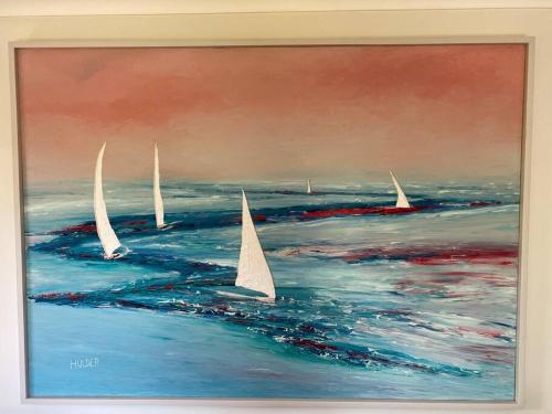 a painting of sailboats in the ocean with aaturation at Open 4 bedroom home in Warrnambool