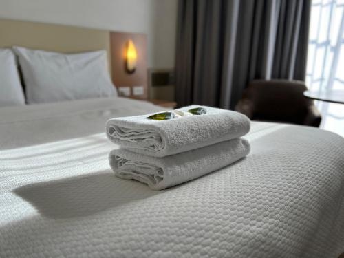 Postel nebo postele na pokoji v ubytování Motel Margeurita