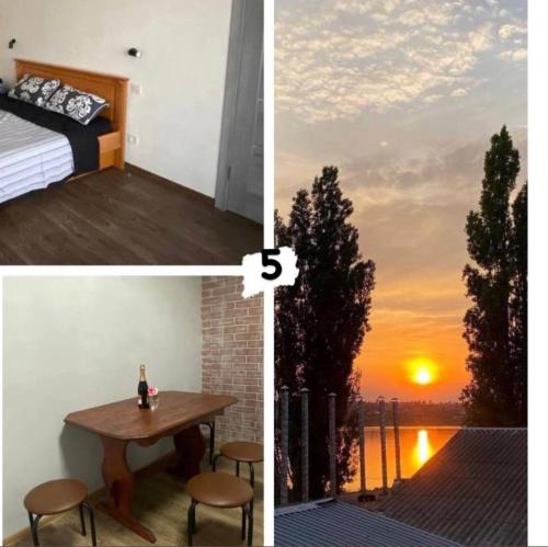 瓦普尼亞爾卡的住宿－Bukhta，配有床和桌子的房间,享有日落美景