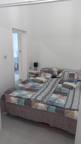 Ліжко або ліжка в номері Panna Apartment Budapest