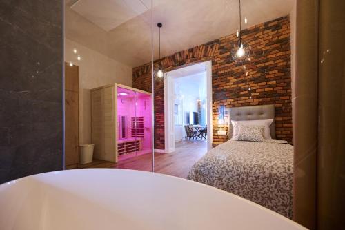 Postel nebo postele na pokoji v ubytování Hiša Ančka, Boutique Hotel & Maja Rooms