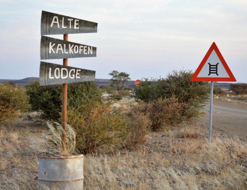 a street sign on the side of a road at Alte Kalkoefen Lodge in Simplon