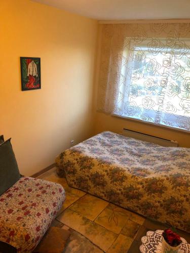 Llit o llits en una habitació de Butas Miško slėnis