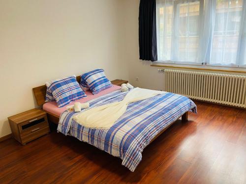 Postel nebo postele na pokoji v ubytování Tranquil Haven Residence