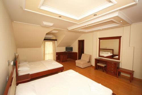 Krevet ili kreveti u jedinici u okviru objekta Hotel RR