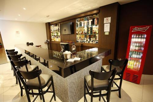 Lounge nebo bar v ubytování Ipe Center Hotel