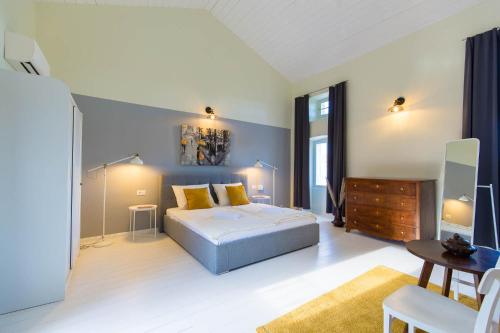 Katil atau katil-katil dalam bilik di CASA MARIO-charming stone house with jacuzzi