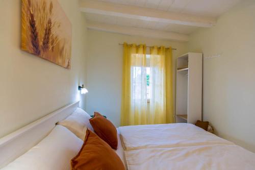 Katil atau katil-katil dalam bilik di CASA MARIO-charming stone house with jacuzzi