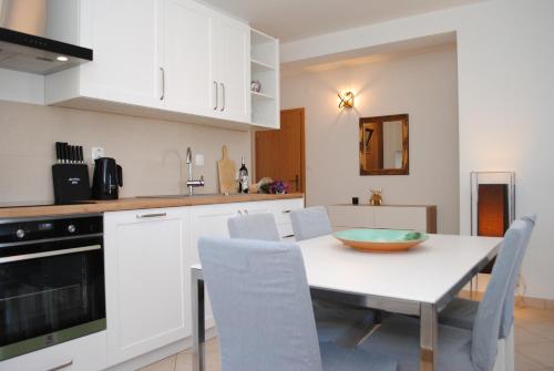 Η κουζίνα ή μικρή κουζίνα στο Apartments Dilk