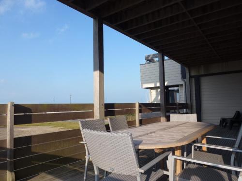 Uma varanda ou terraço em Le Normandy