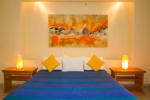 Ένα ή περισσότερα κρεβάτια σε δωμάτιο στο Tripui Hotel