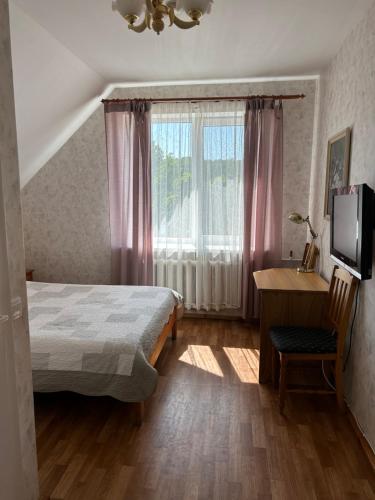 Postel nebo postele na pokoji v ubytování Radi