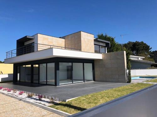 a rendering of a modern house with at Villa - Âncora - 300 mètres de l’océan in Vila Praia de Âncora