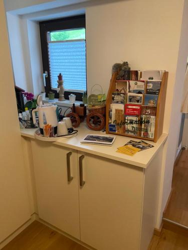a counter in a room with a window at Landhaus Aigner in Mittersill