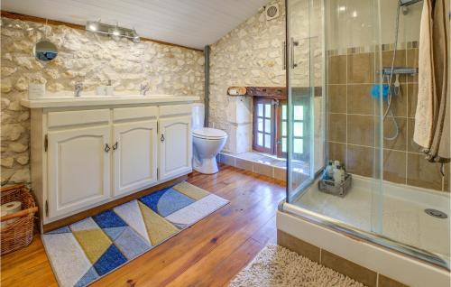 a bathroom with a shower and a sink and a toilet at Amazing Home In Douzillac With 4 Bedrooms And Outdoor Swimming Pool in Douzillac