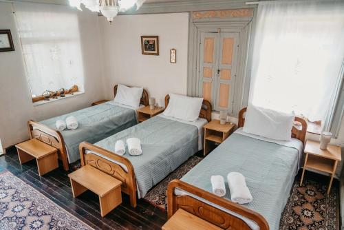 Postel nebo postele na pokoji v ubytování Guest House Edmond
