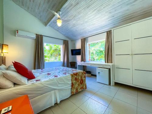Cama o camas de una habitación en Pousada Tatuapara