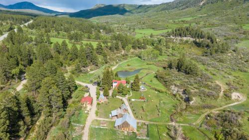 an aerial view of a house on a hill at 3076 W Highway 160 - Combo in Mancos